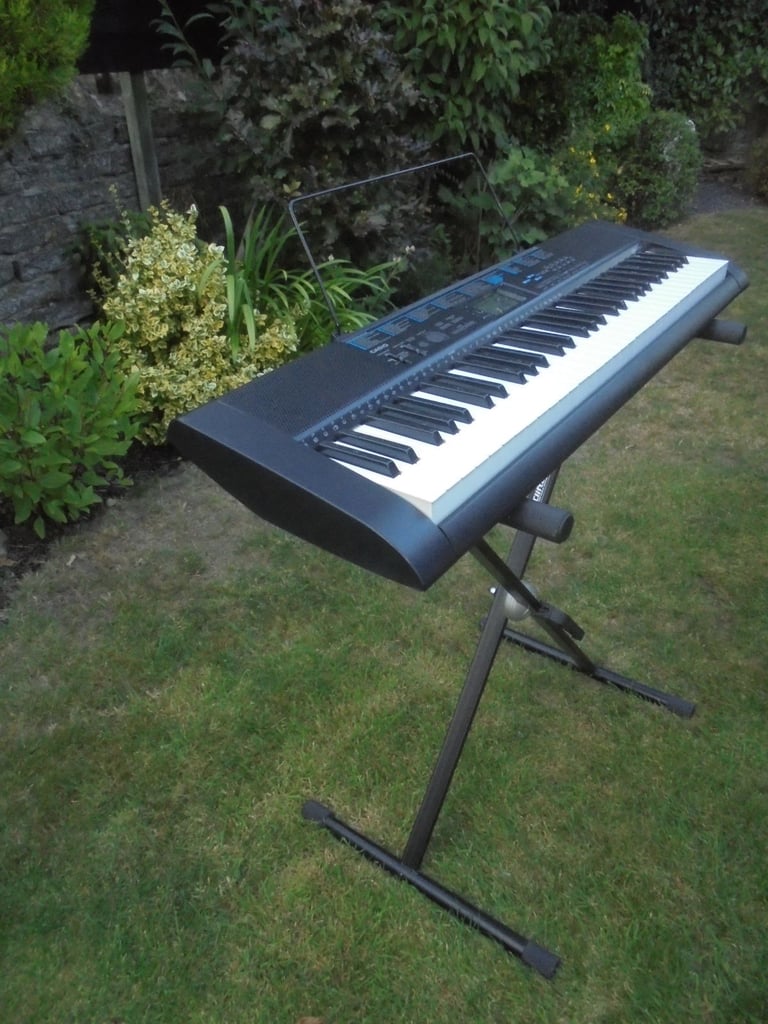 CASIO Piano/Keyboard + User's Guide & CASIO Song Book