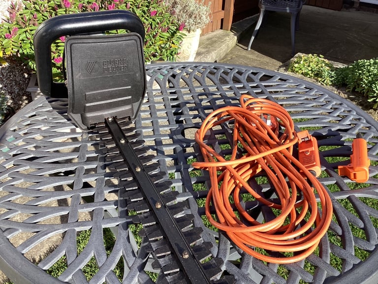 image for Black and Decker hedge trimmer for sale.