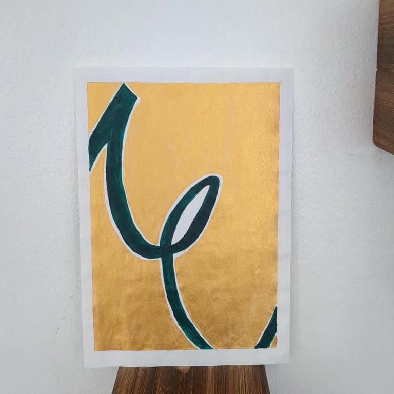 Gold and green abstract art work   