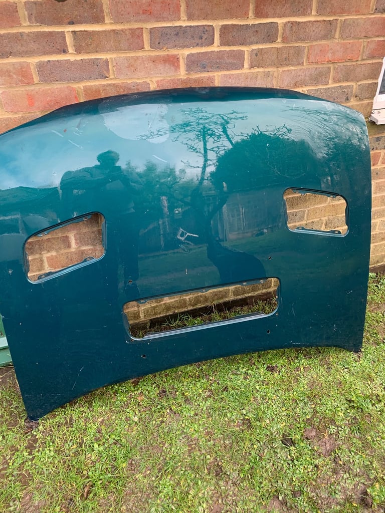 image for Subaru bonnet no vents has small damage 