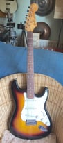 SUNBURST STRATOCASTER COPY. SQUIER(?). GREAT GUITAR. FULLY SET UP AND READY TO GO.