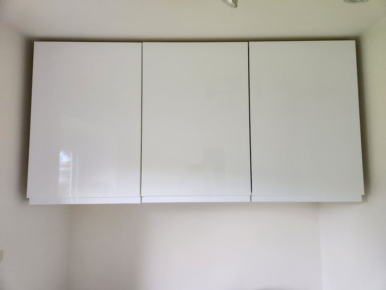 image for Three White IKEA Kitchen or Bathroom cupboards with shelving.