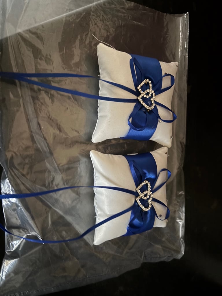 Wedding ring cushions and wedding table vases 