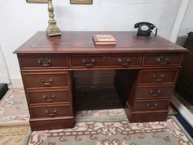Lovely large double pedestal desk with oxblood leather inlay
