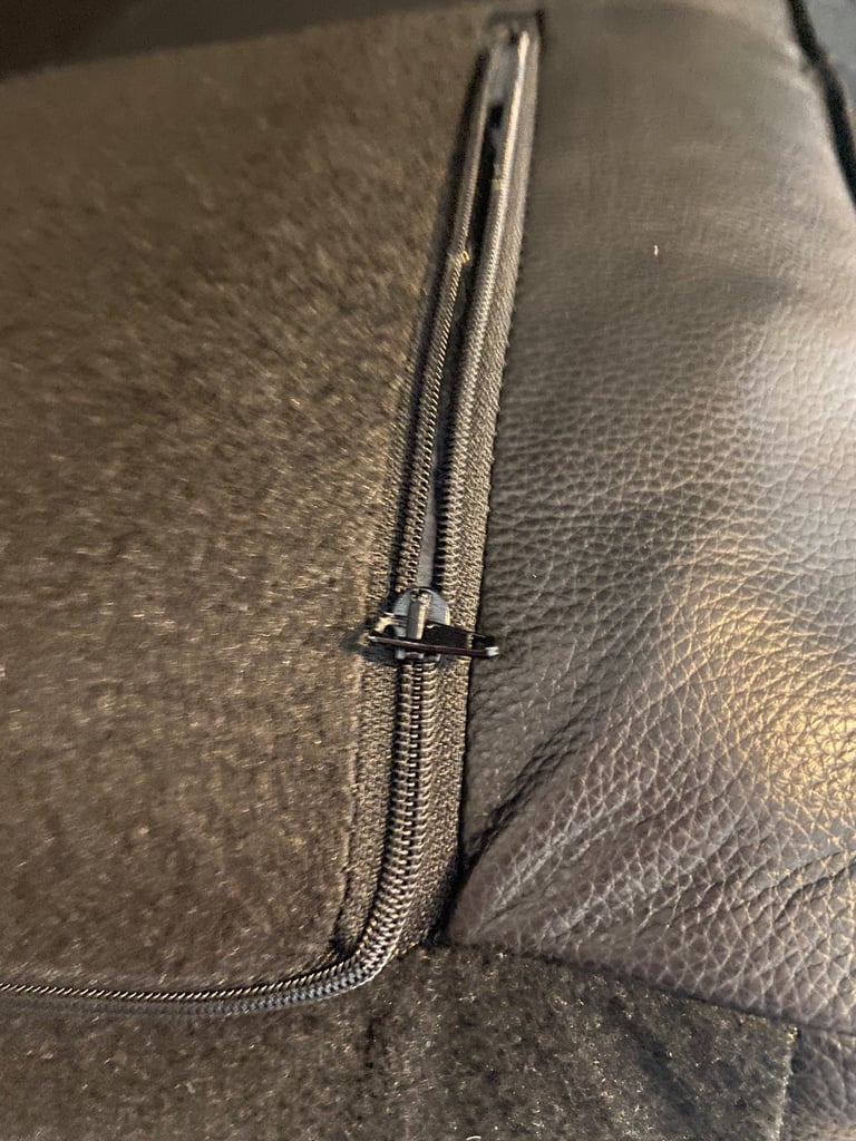 2 firm decorative leather pillows.