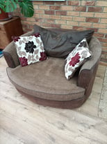 Swivel cuddle sofa/chair 