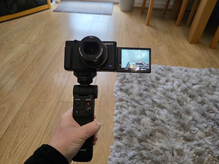Sony ZV-1 vloggers camera with case, 4x batteries and  tripod camera grip