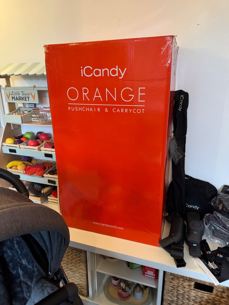 Icandy orange pushchair & carrycot with accessories