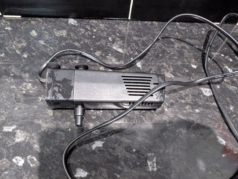 Fish tank with pump and ornaments 