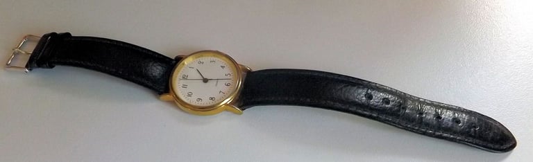 UNISEX QUARTZ WATCH WITH GOOD QUALITY BLACK LEATHER STRAP. G.W.O.