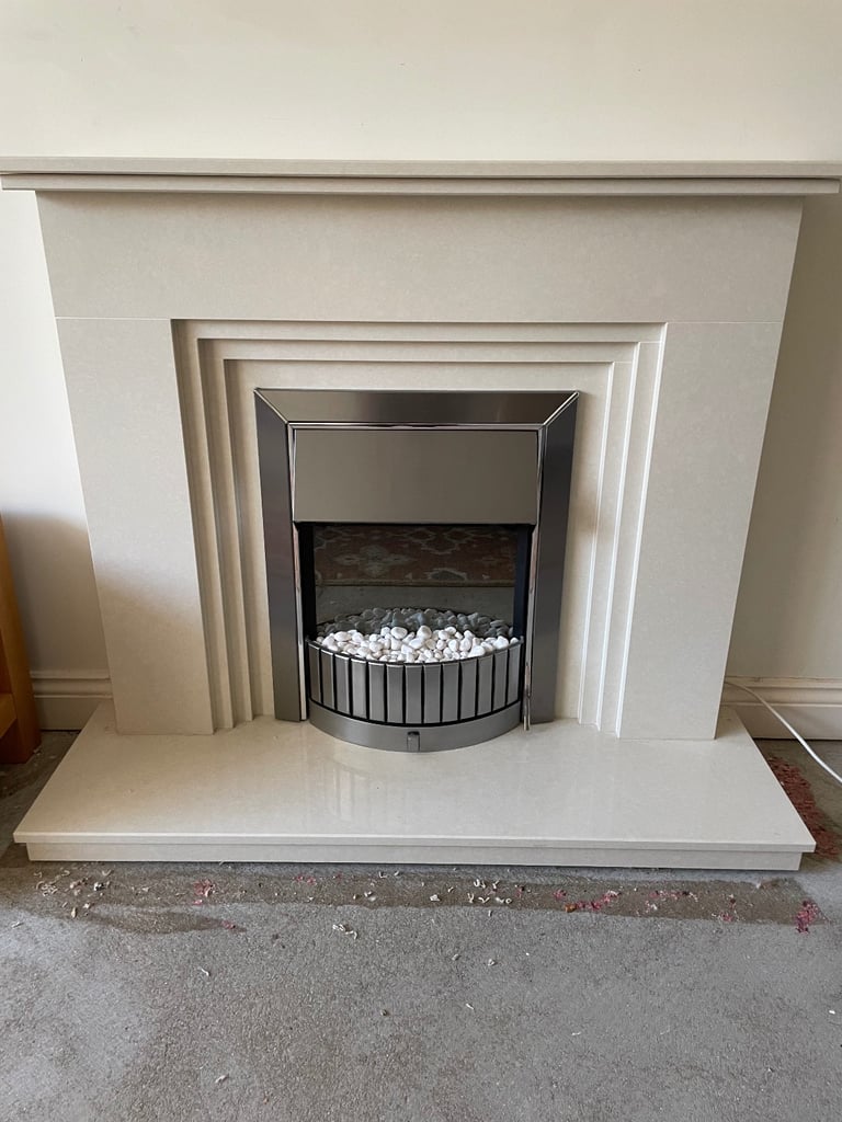 Heavy marble fireplace and fire