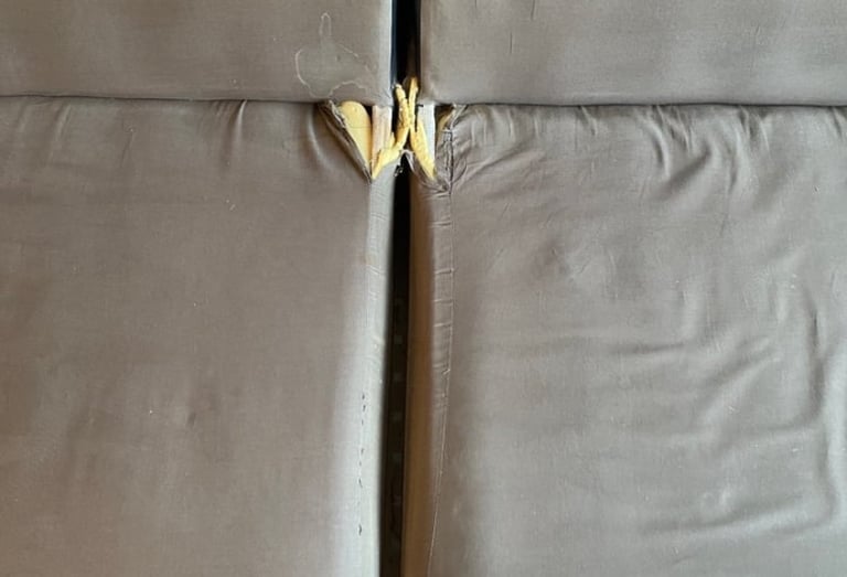 A faux leather sofa in the colour black