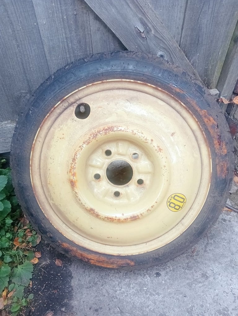 Yellow emergency spare wheel yellow wheel tyre