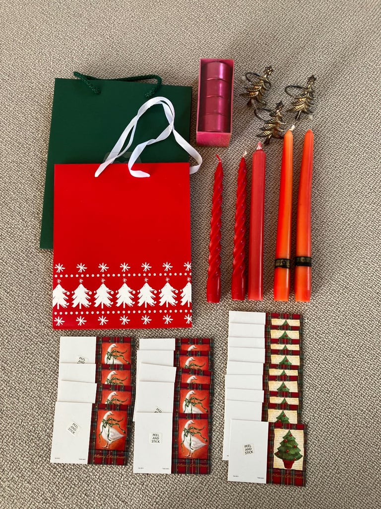 image for Christmas: 5 red tall candles/7 serviette holders/2 gift bags/18 gift labels.