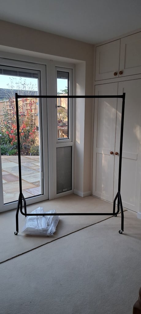 Heavy duty clothes rail with zip cover