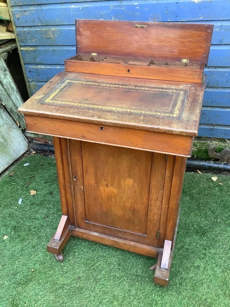 Victorian walnut brown leather insert davenport with ink wells & wheel castors