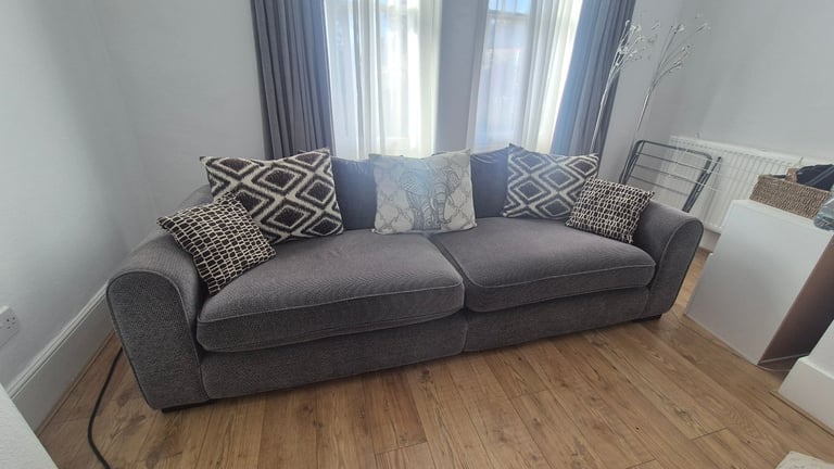4 seater Sofa with footstall