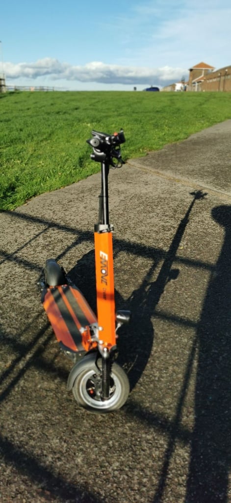 From USA an Orange electric scooter EMOVE Cruiser 'S' 52V 1600W Dual