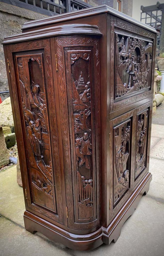 20th century Chinese heavily carved camphor wood cocktail bar cabinet