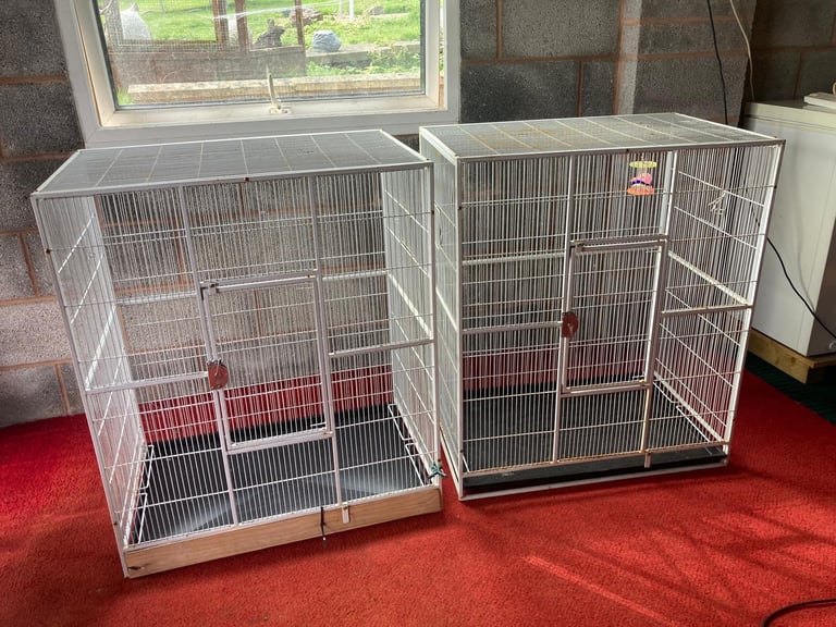 2 identical bird / parrot cages