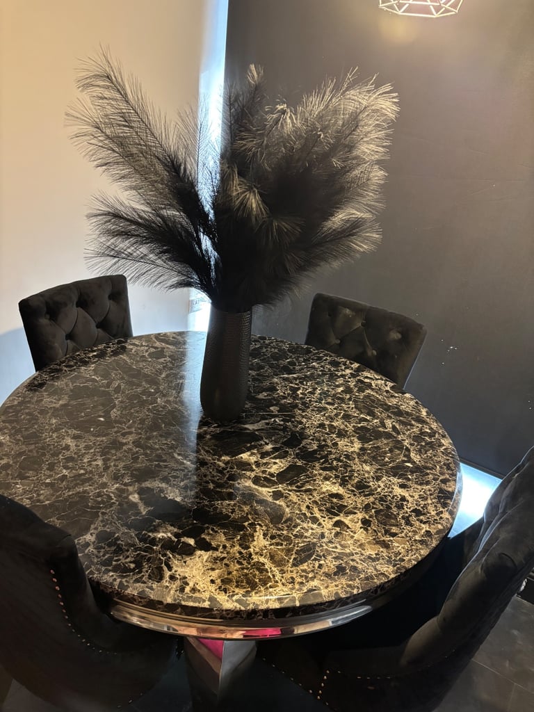 Black marble dinning table and chairs 