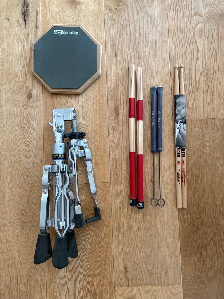 Drum practice pad with stand and drumstick set