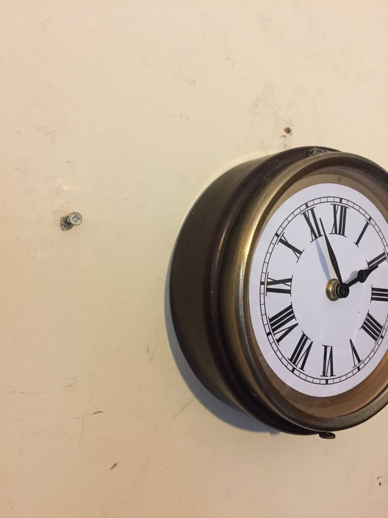 vintage 1930s industrial wall clock converted to quartz battery movement