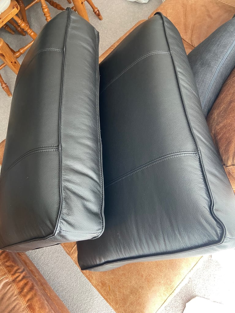 image for 2 firm decorative leather pillows.