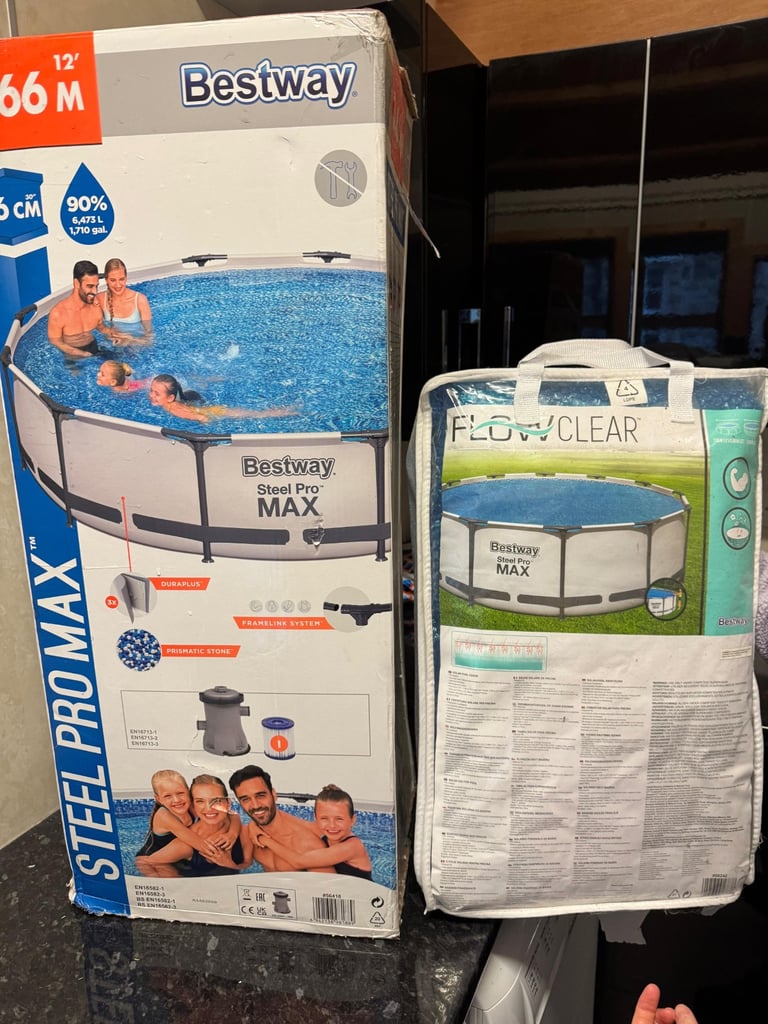 12 ft above ground swimming pool and solar cover 