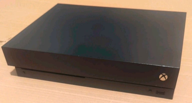 Xbox one X 4K console 1TB + games (no controller)