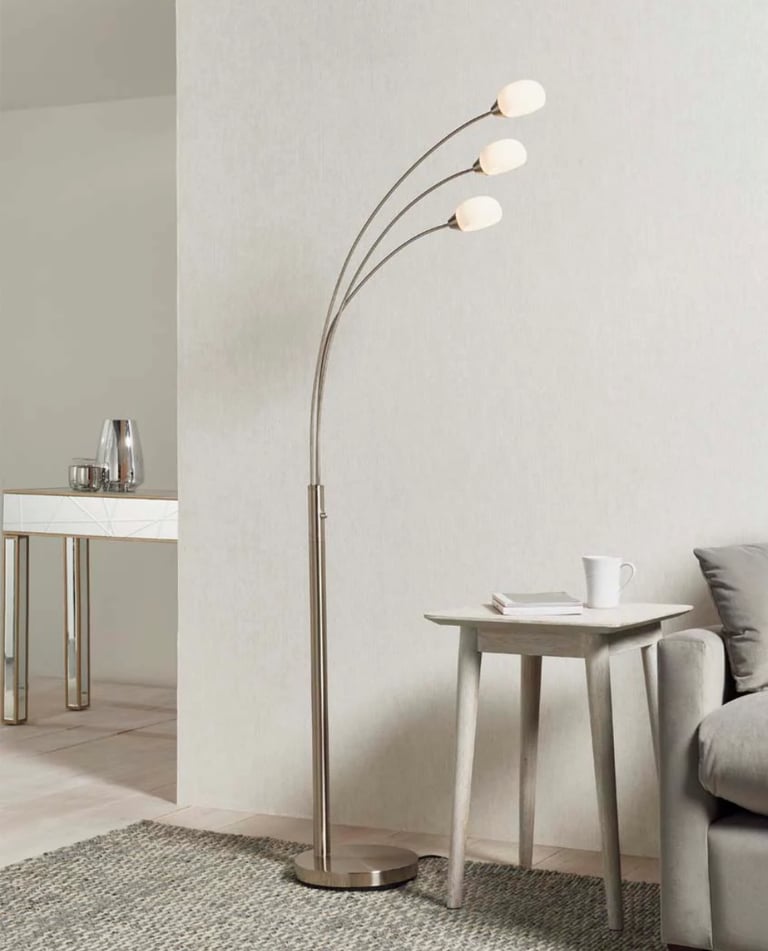 LED Modern floor lamp boasting a satin nickel finish