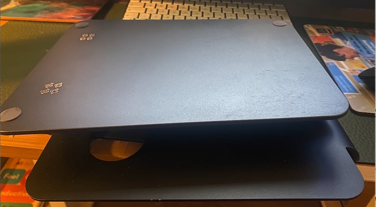 Adjustable metal laptop stand – sturdy, tilting, great condition