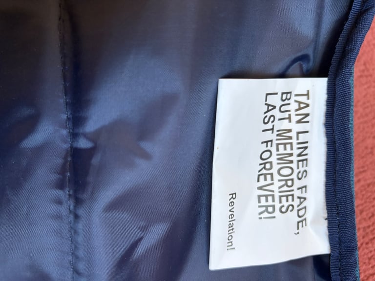 Small suitcase with wheels and extending handle