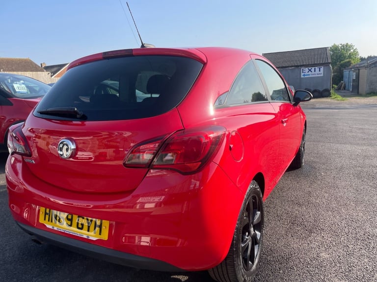 VAUXHALL CORSA 1.4 GRIFFIN with full main dealer service history, bright red,