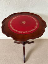 OCCASIONAL WOODEN CIRCULAR PEDESTAL TABLE WITH RED LEATHER IN-LAY