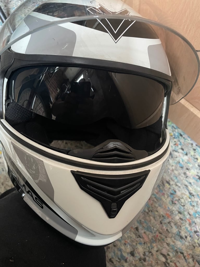 image for Xl motorbike helmet/ waterproof trousers 