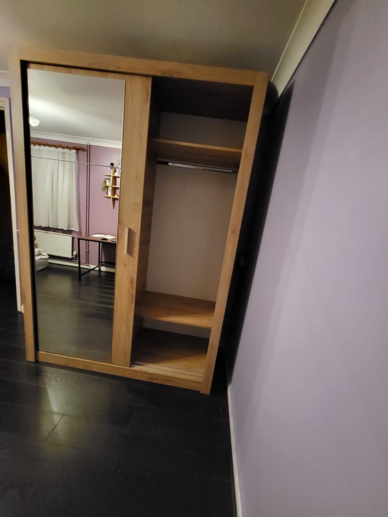 Large double wardrobe with mirror panel