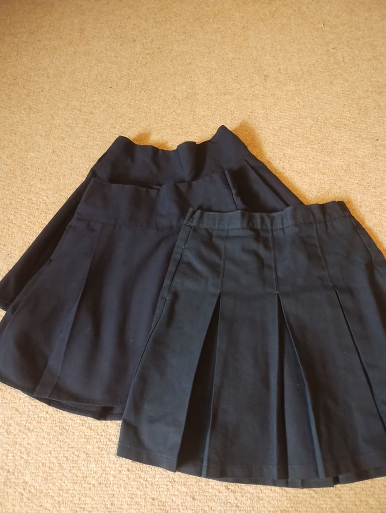 Girls Navy school skirts age 6-7 years