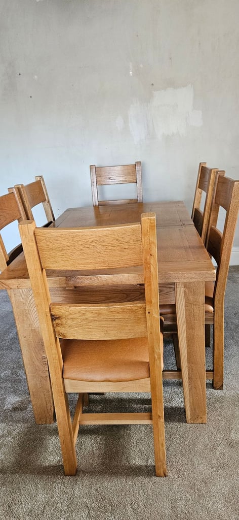 Oak dining table with six chairs and oak dresser