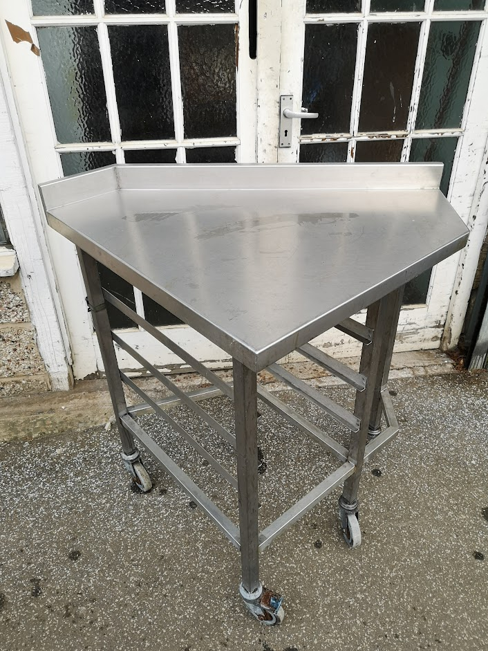 Pure Stainless steel table on castors.