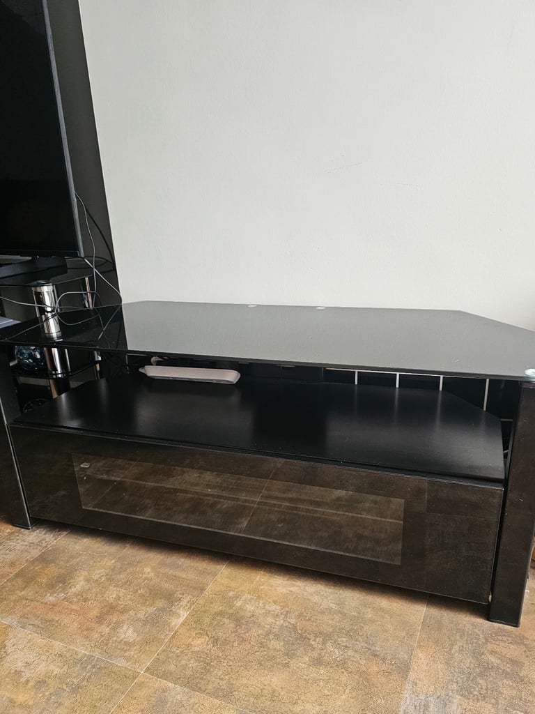 image for Solid glass tv stand holds my 65inch tv 