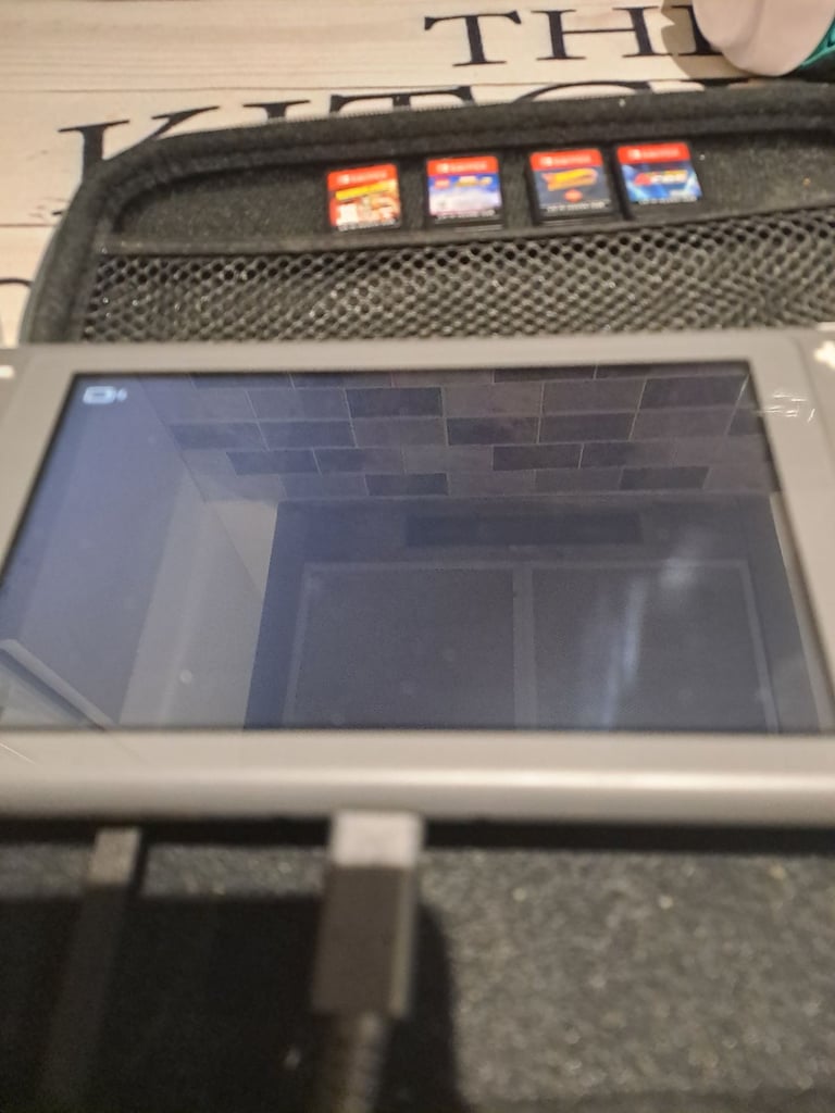 Nintendo switch lite with games and headset