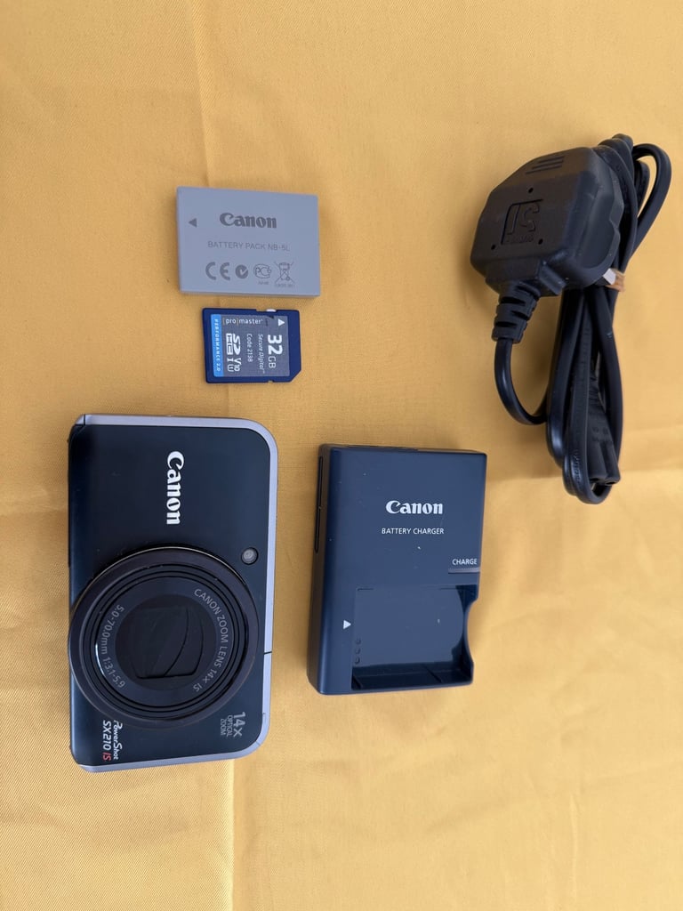 CANON POWERSHOT SX210 IS FULLY WORKING GOOD CONDITION 