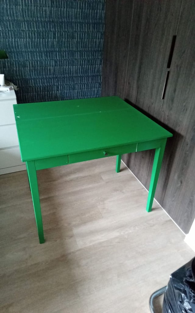 Green extendable table with drawer