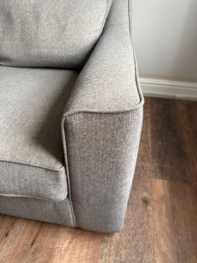 DFS grey armchair 