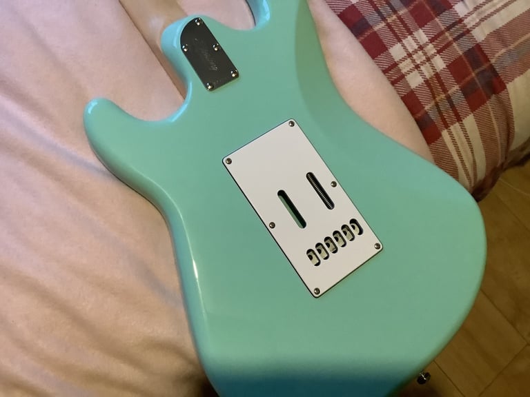 Stirling  Cutlass by music man Guitar