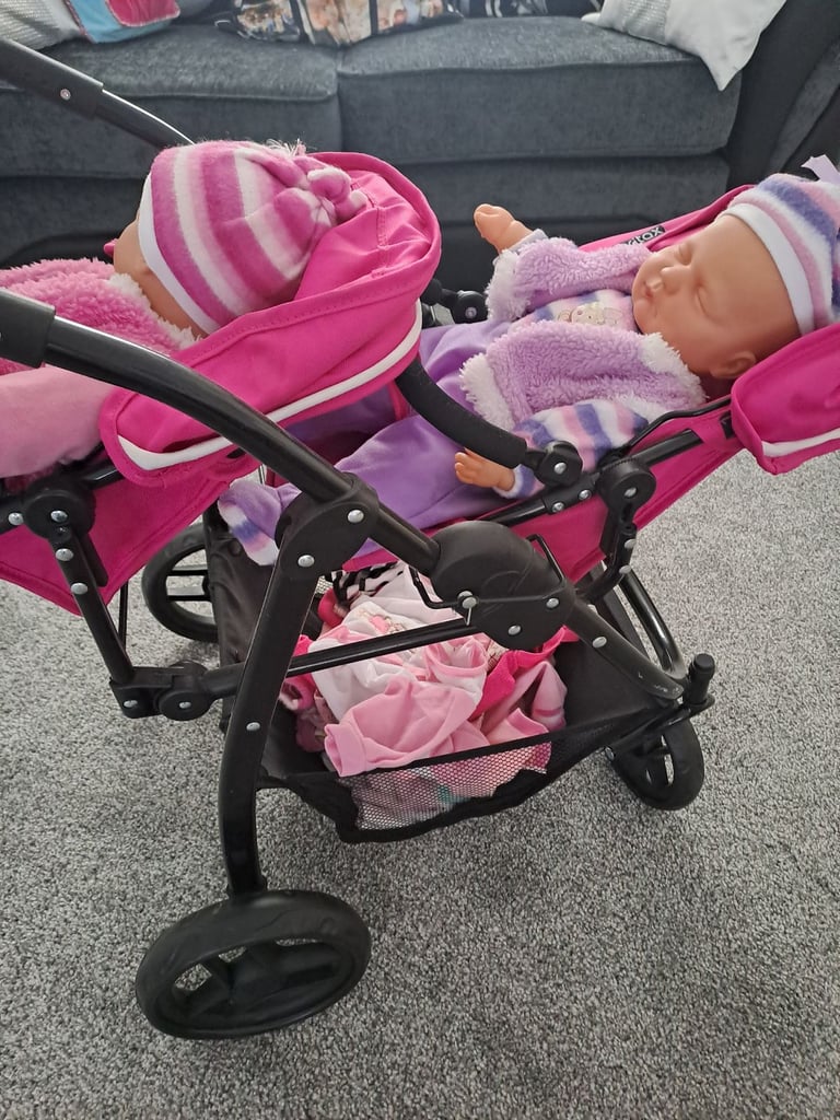 Childrens twin buggies with twin dolls 