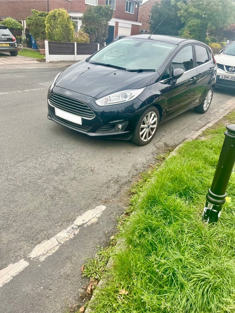 Ford fiesta titanium 1.5 diesel black 5 door 65 reg 70k miles bargain price may px 