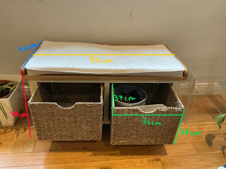 Small multipurpose storage and sitting cabinet.