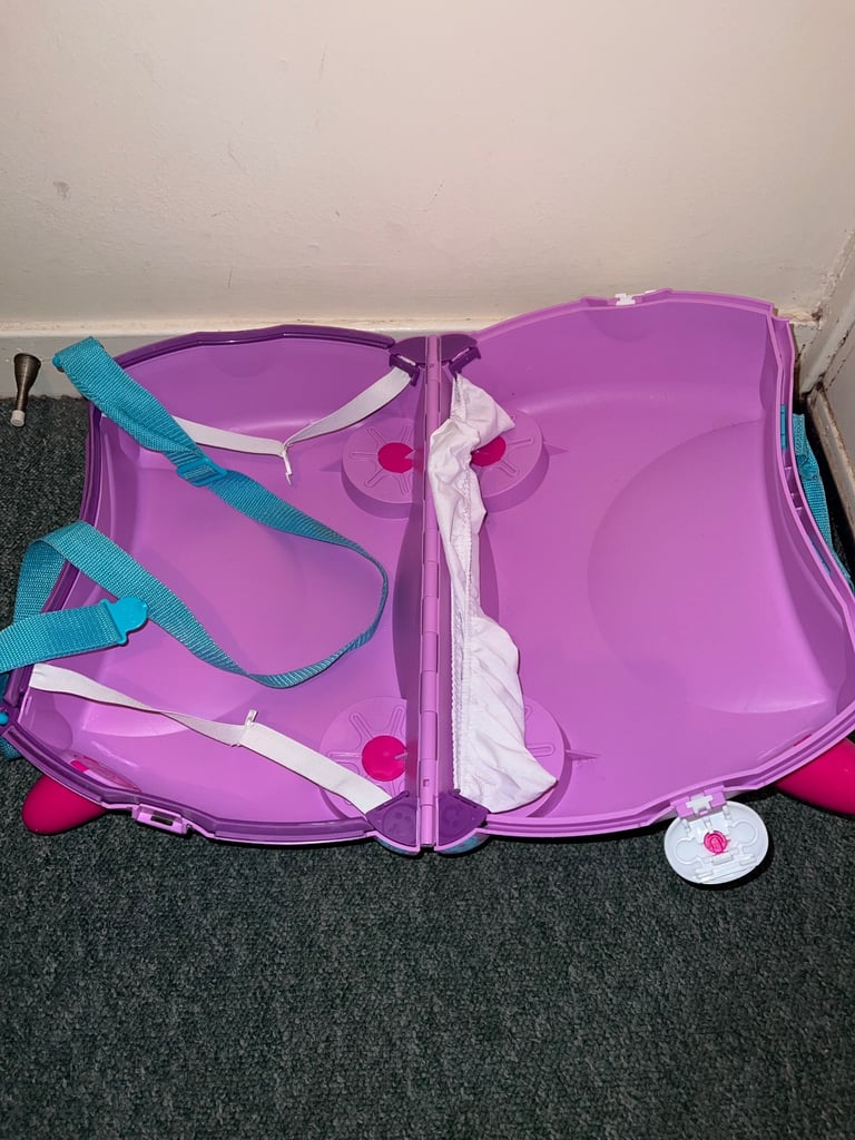 Used kids Purple Trunki Ride on 